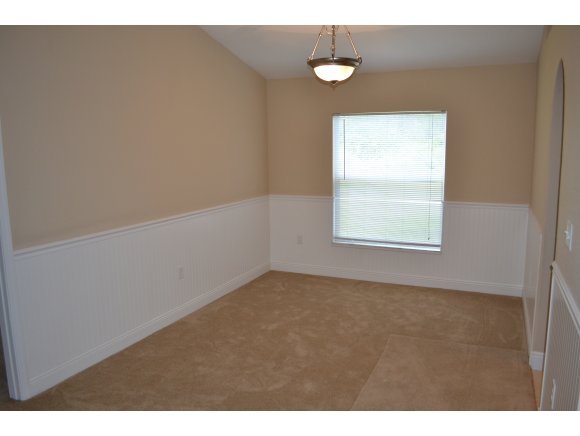 449 Southwest Scanlon Palm Bay, FL 32908 - Photo 5 of 12 a view of an empty room with a window