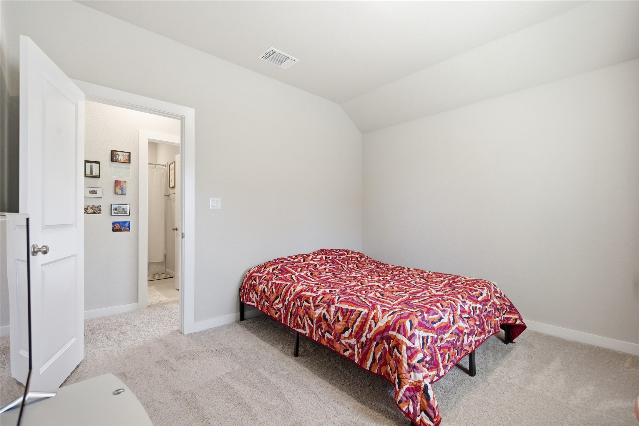 1008 Summer Glen Georgetown, TX 78628 - Photo 29 of 34 a bedroom with a bed and a night stand