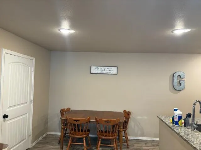 a room with furniture a desk and chair