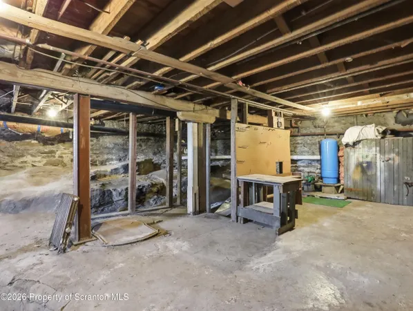 a view of an empty room with storage