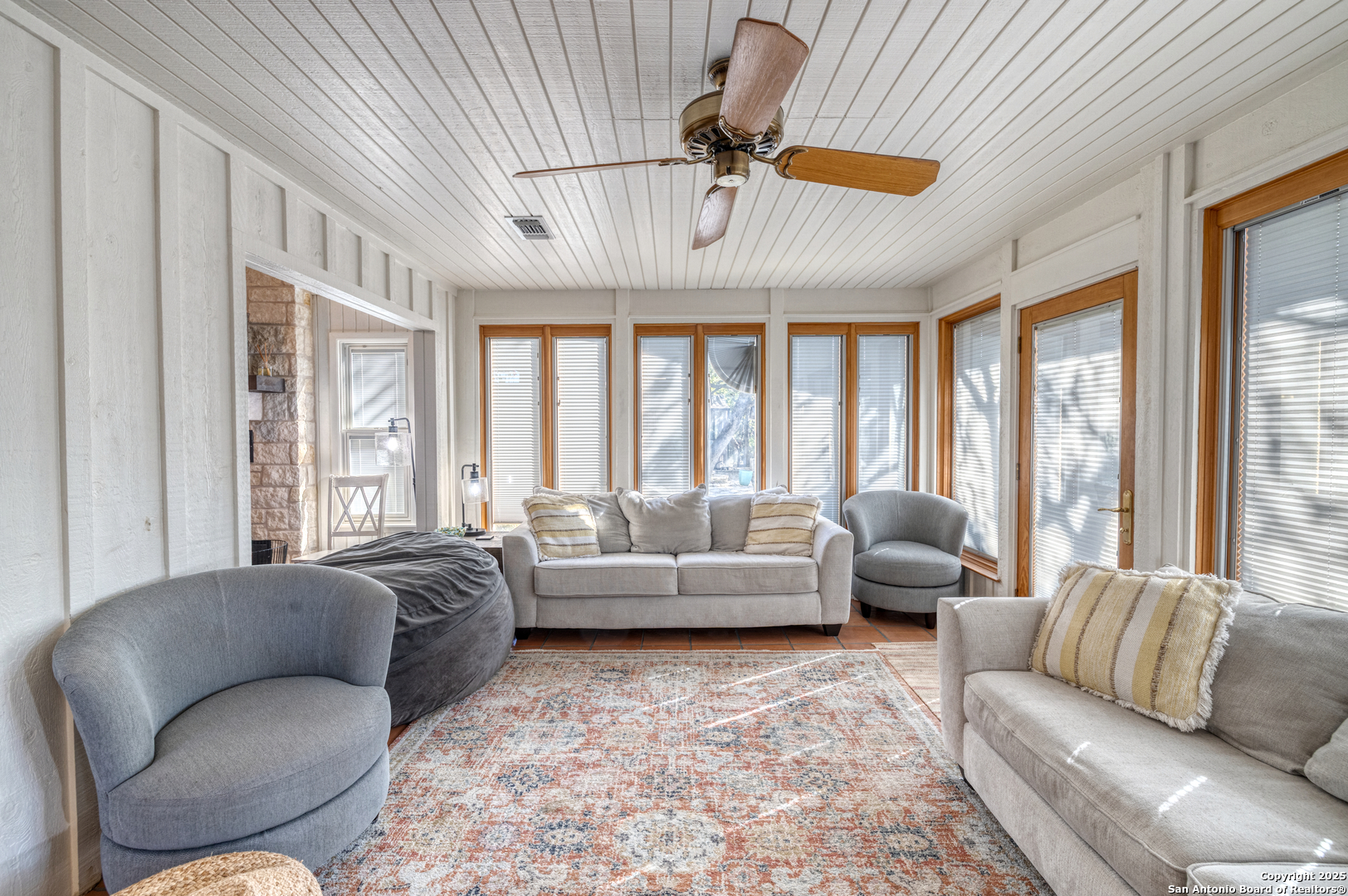 416 Cold Spring River Concan, TX 78838 - Photo 14 of 57 a living room with furniture and a large window