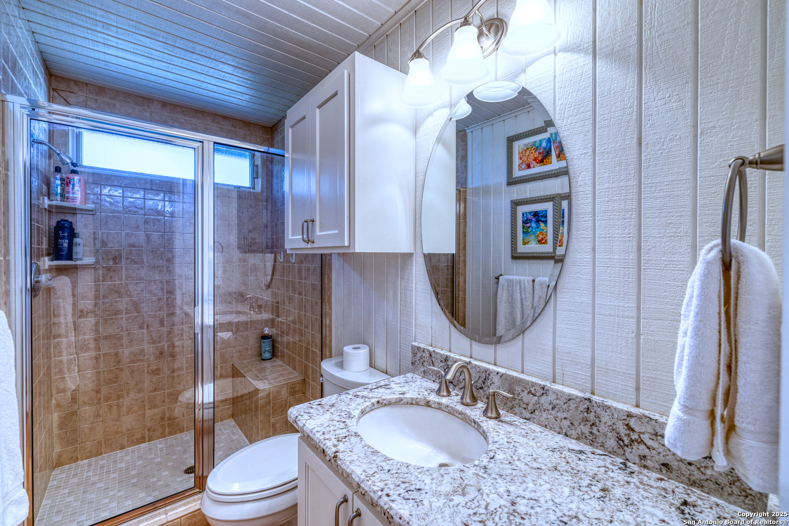 416 Cold Spring River Concan, TX 78838 - Photo 15 of 57 a bathroom with a sink a toilet and shower