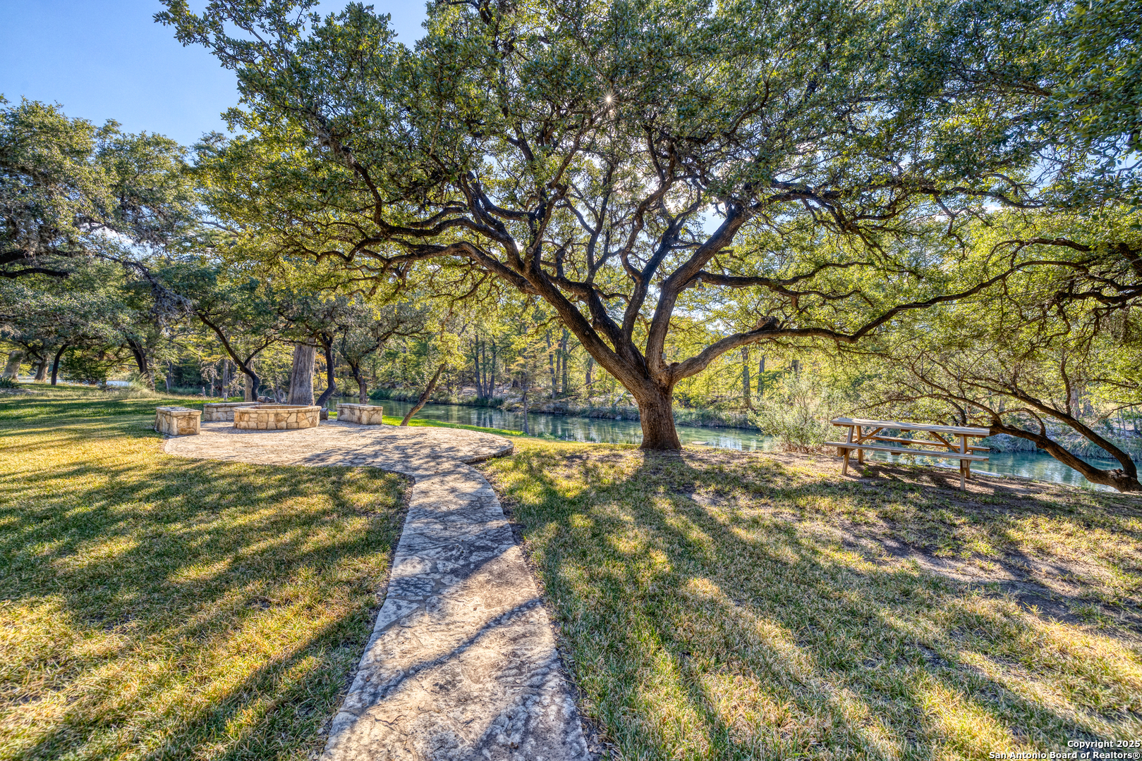 416 Cold Spring River Concan, TX 78838 - Photo 22 of 57 a view of yard with trees