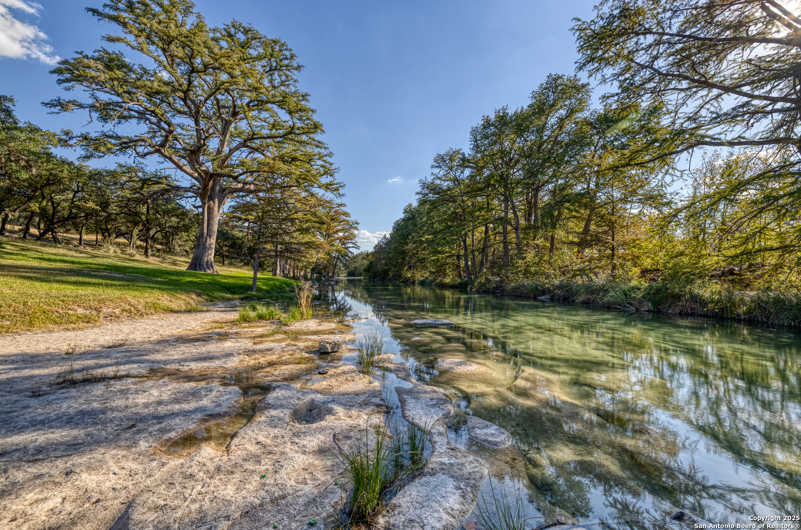 416 Cold Spring River Concan, TX 78838 - Photo 25 of 57 a view of a yard with an outdoor space