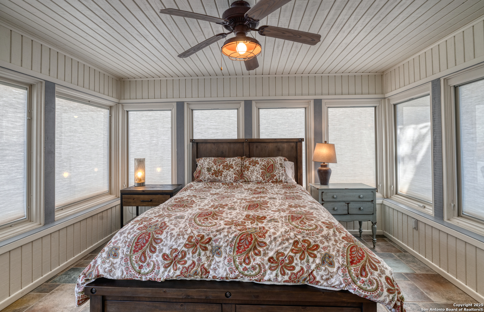 416 Cold Spring River Concan, TX 78838 - Photo 28 of 57 a bed sitting in a bedroom next to a window