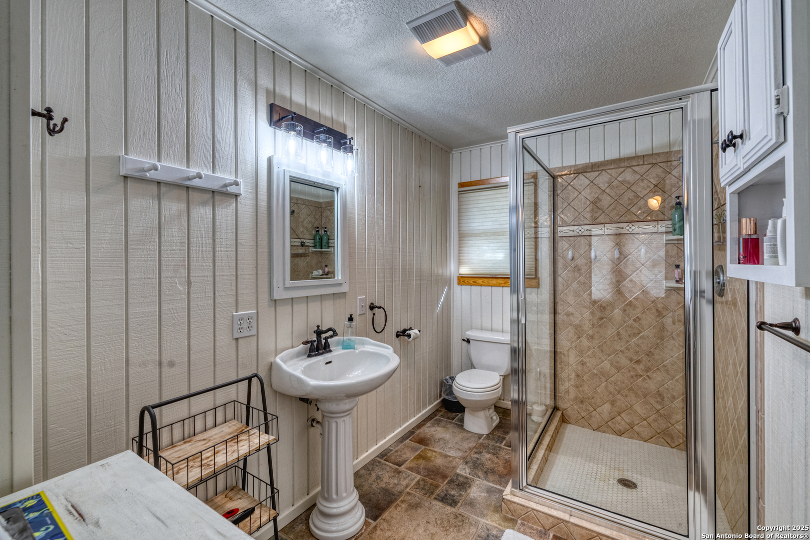 416 Cold Spring River Concan, TX 78838 - Photo 30 of 57 a bathroom with a sink toilet and shower