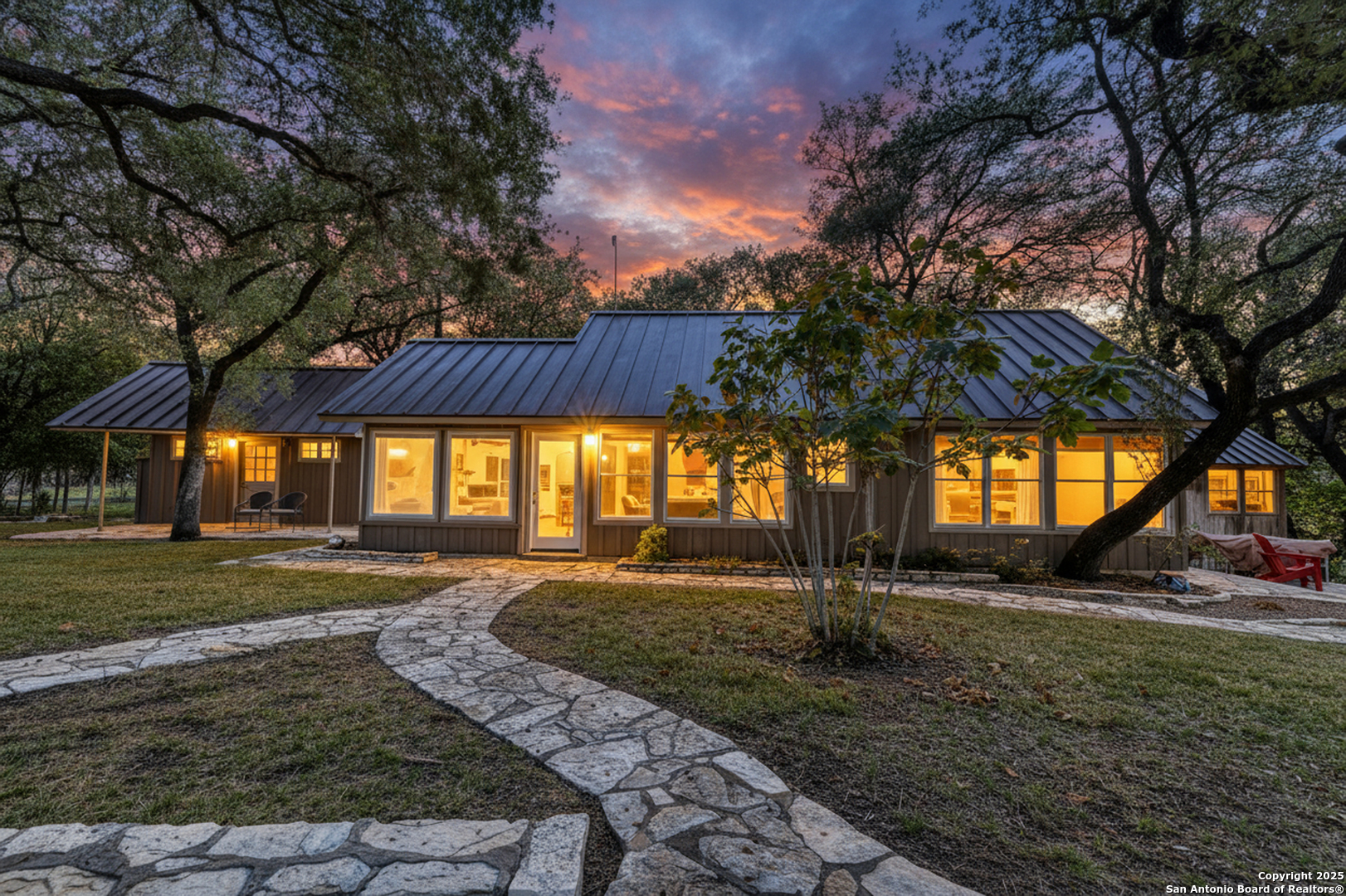 416 Cold Spring River Concan, TX 78838 - Photo 35 of 57 a view of a yard with plants and a large tree