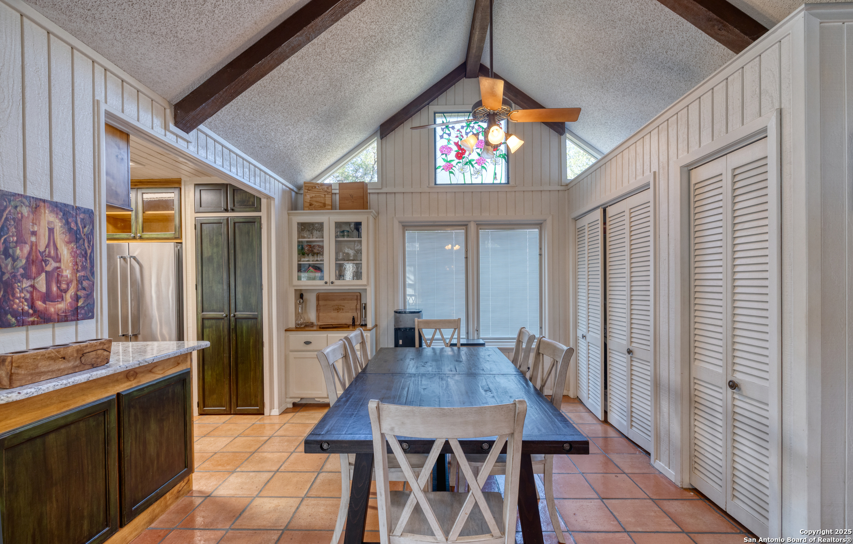 416 Cold Spring River Concan, TX 78838 - Photo 36 of 57 a view of a dining room with furniture window and wooden floor