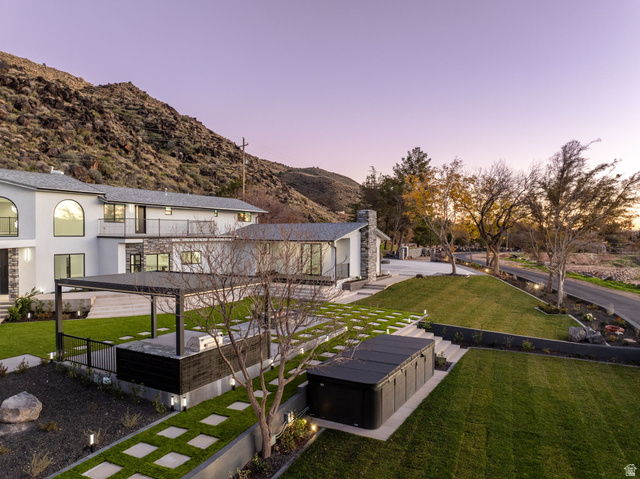 476 Spring Drive Toquerville, UT 84774 - Photo 78 of 95 Rear view of property featuring a lawn, a patio area, stucco siding, and a mountain view