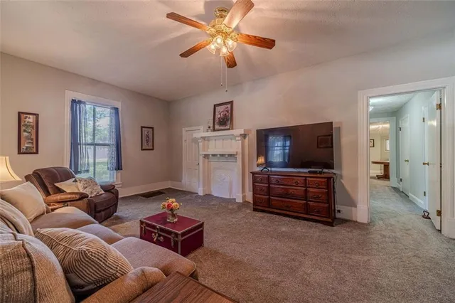 a bedroom with furniture and a window