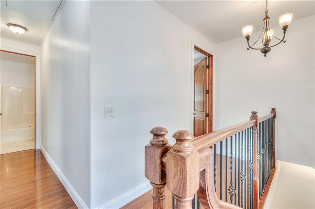 11070 Buchanan Highway Temple, GA 30179 - Photo 19 of 32 a view of a hallway with wooden floor and staircase
