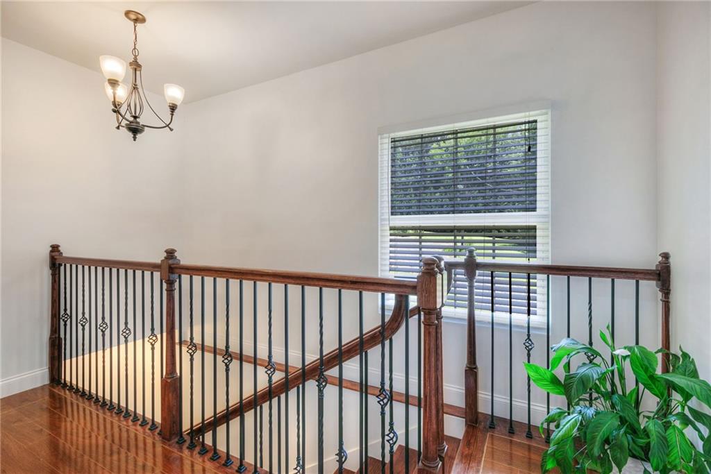11070 Buchanan Highway Temple, GA 30179 - Photo 27 of 32 a view of a balcony with wooden floor