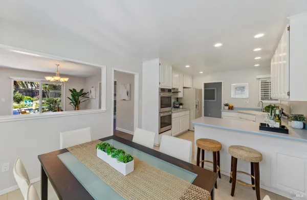 a living room with furniture and a table