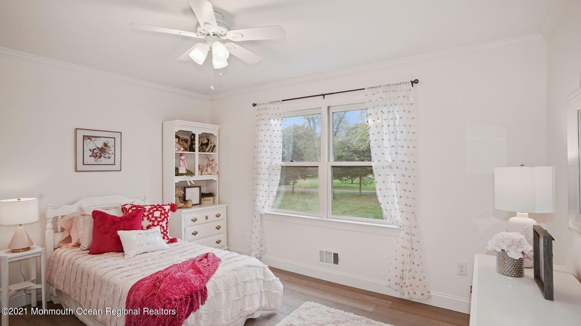 28 Driftway Road Howell, NJ 07731 - Photo 21 of 47 a bedroom with a bed and a window