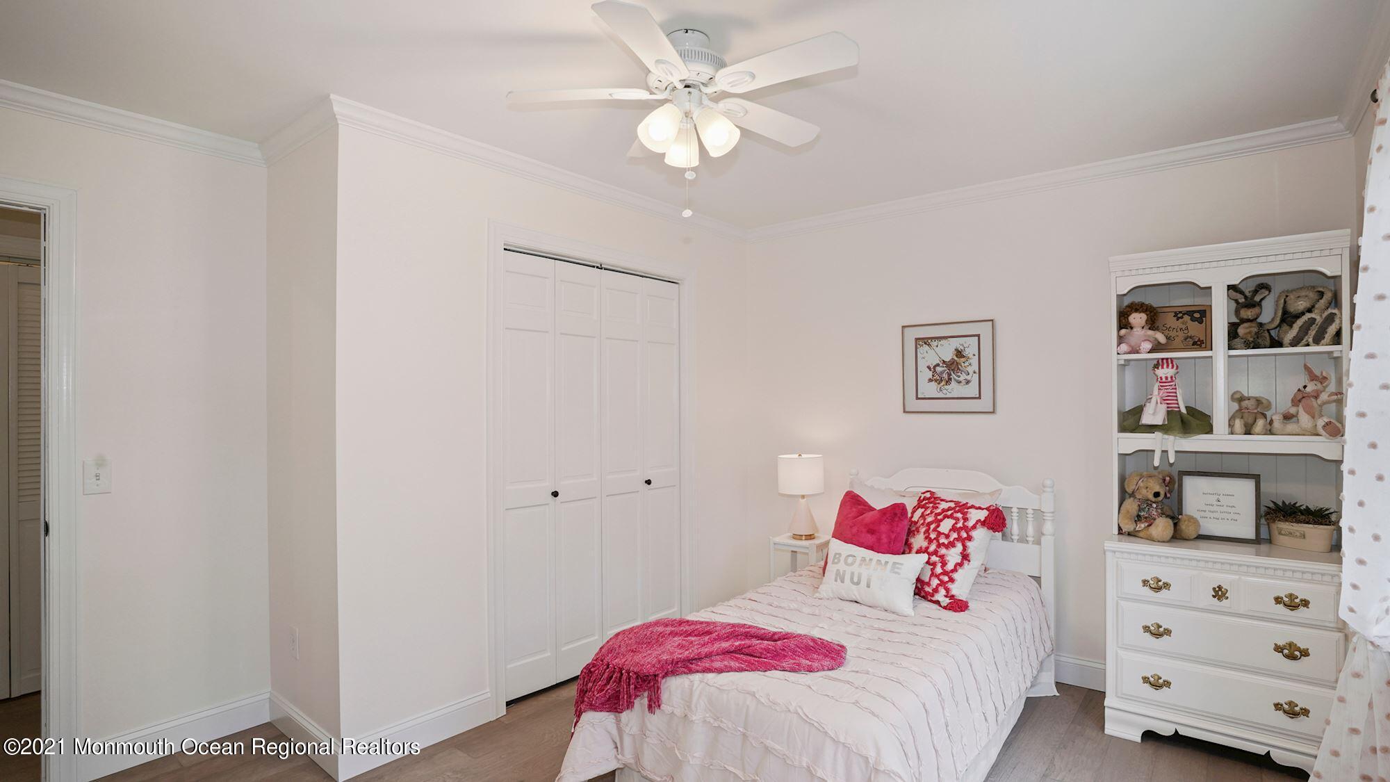 28 Driftway Road Howell, NJ 07731 - Photo 22 of 47 a bedroom with a bed and a dresser