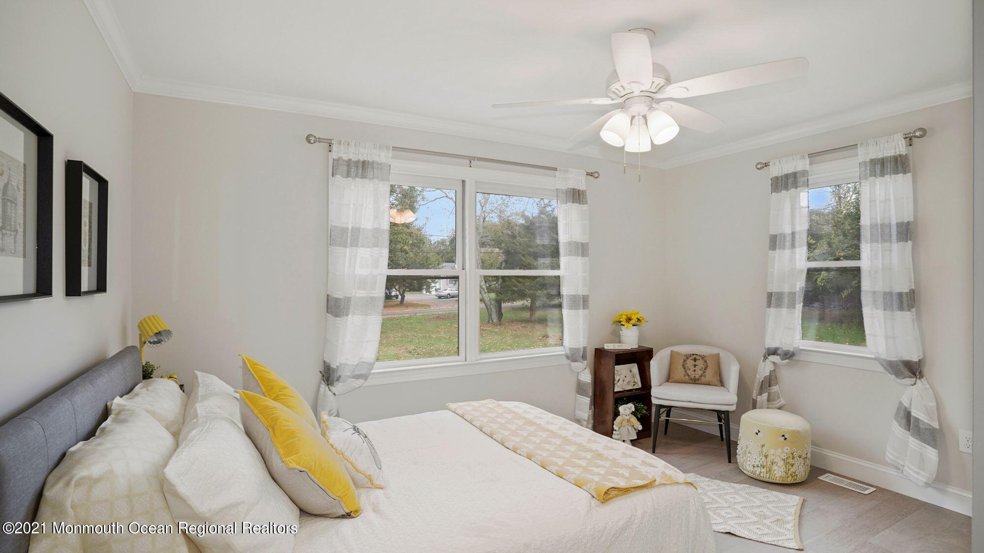 28 Driftway Road Howell, NJ 07731 - Photo 25 of 47 a bedroom with a bed and a large window