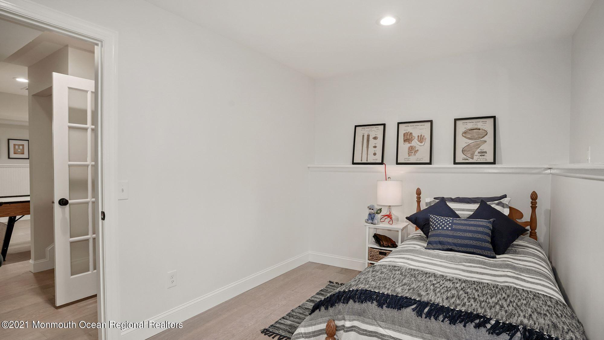 28 Driftway Road Howell, NJ 07731 - Photo 33 of 47 a bedroom with a bed and a window