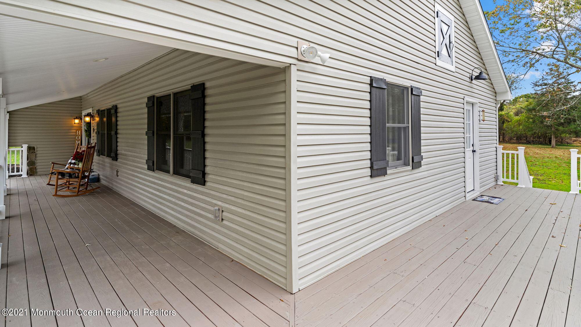 28 Driftway Road Howell, NJ 07731 - Photo 42 of 47 a view of a house with a barbeque