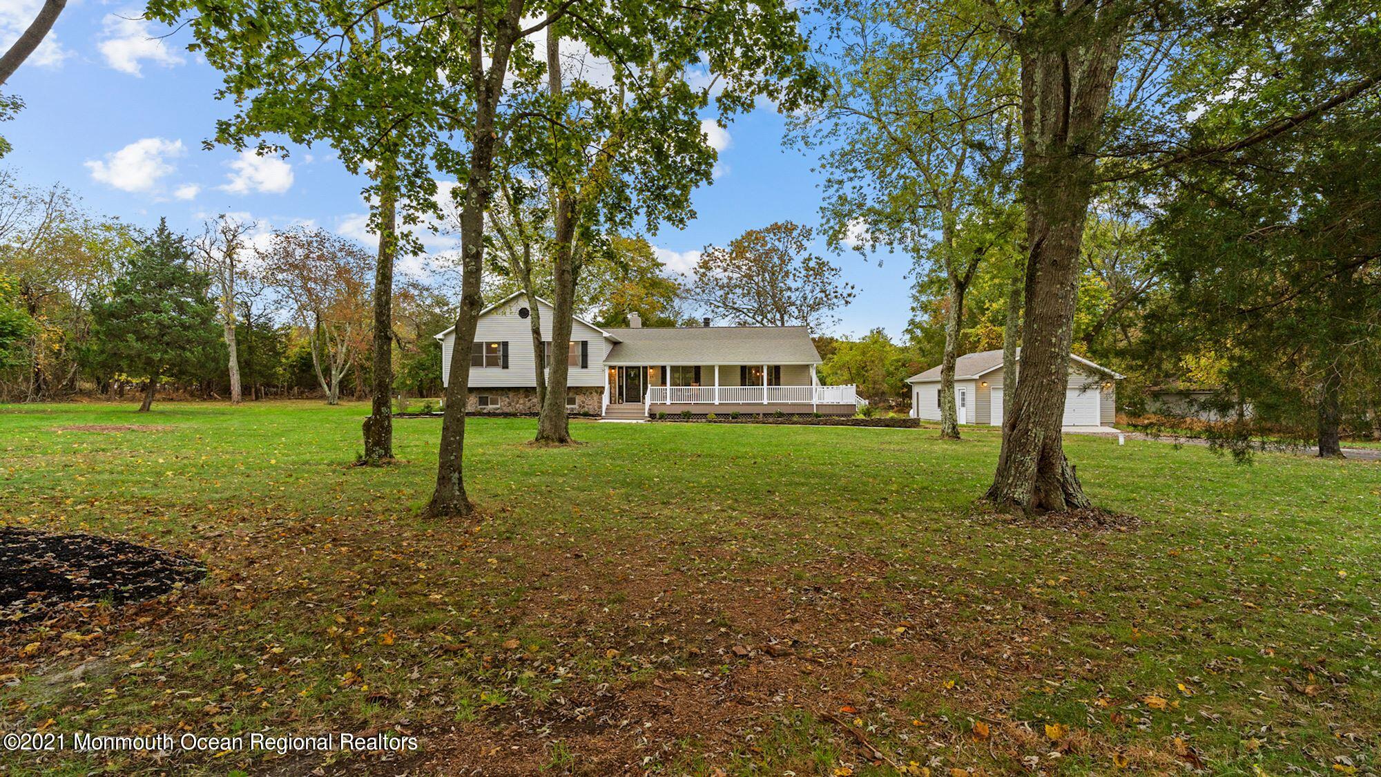 28 Driftway Road Howell, NJ 07731 - Photo 45 of 47 a view of a house with a yard
