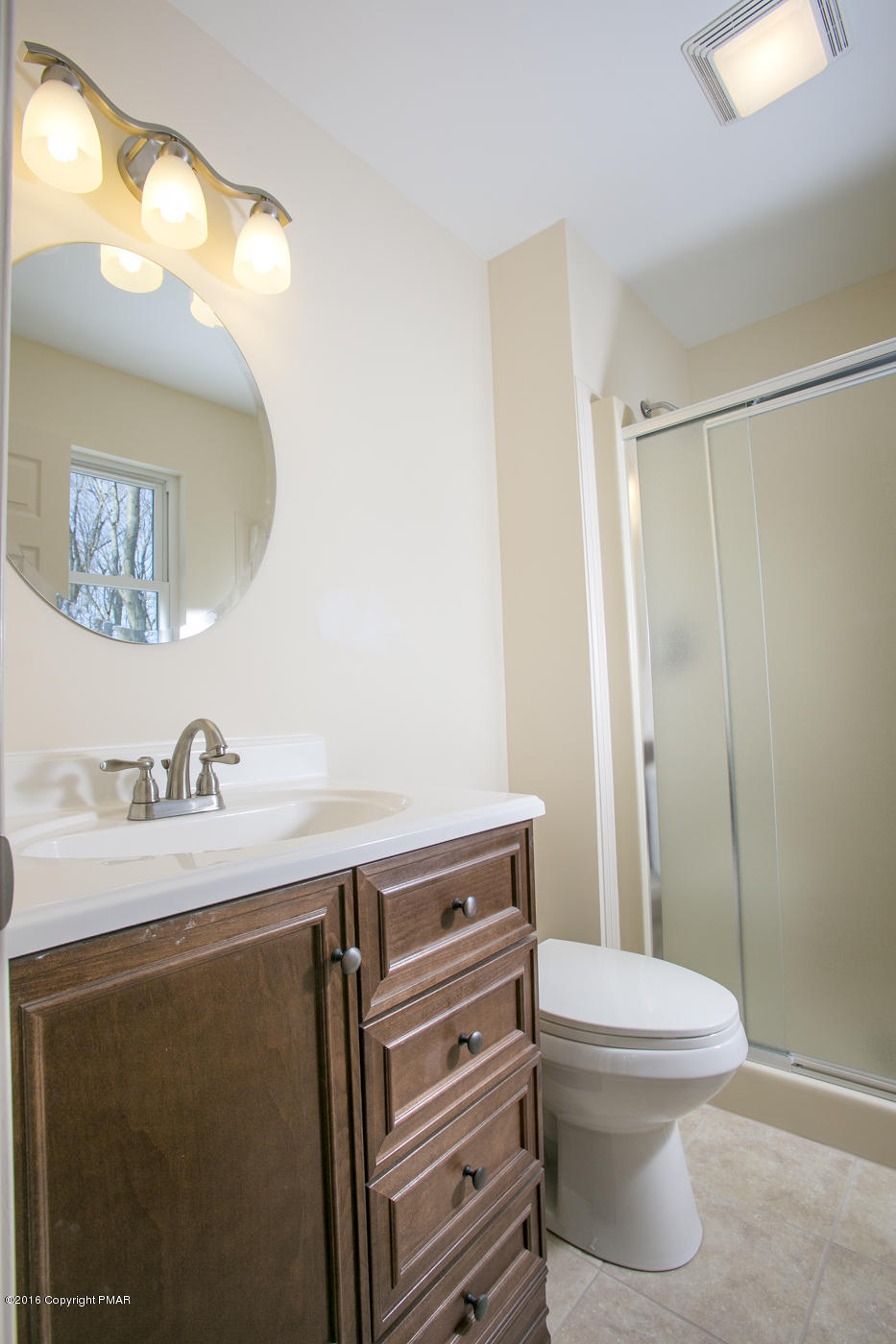 20 Cedar Road Mount Pocono, PA 18344 - Photo 24 of 43 a bathroom with a sink a toilet and a mirror
