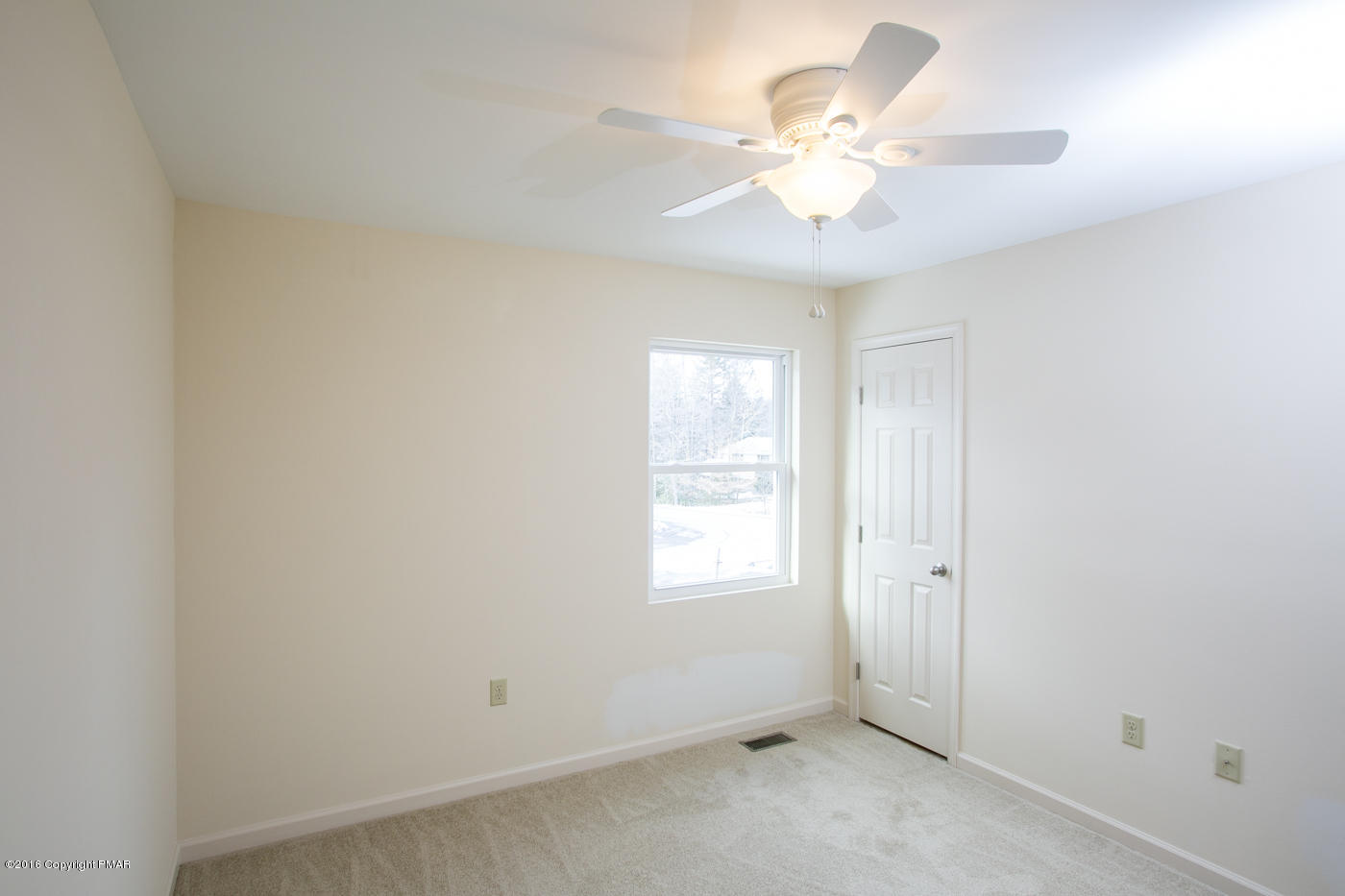 20 Cedar Road Mount Pocono, PA 18344 - Photo 28 of 43 an empty room with windows and ceiling fan