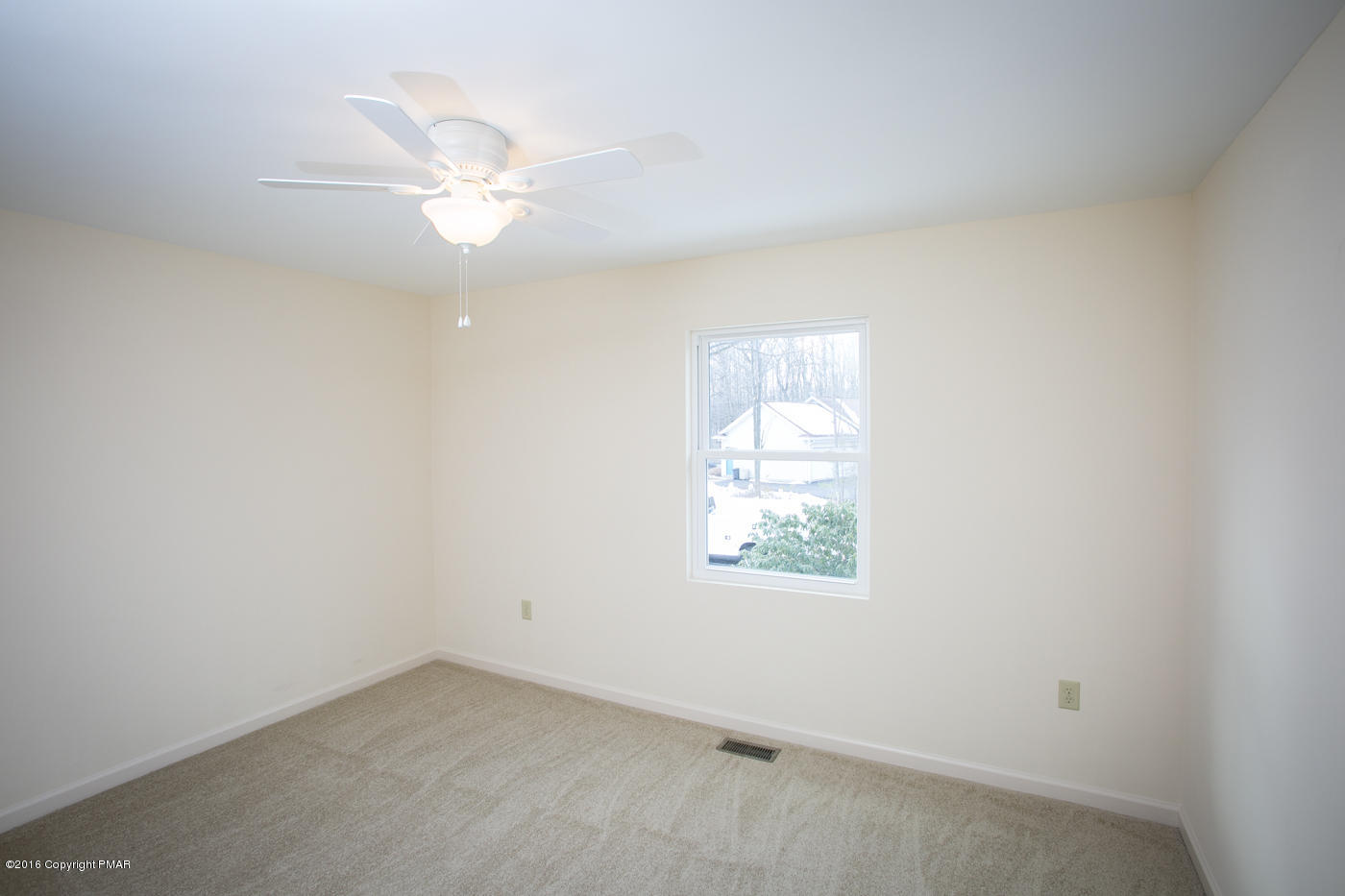 20 Cedar Road Mount Pocono, PA 18344 - Photo 29 of 43 an empty room with windows and fan
