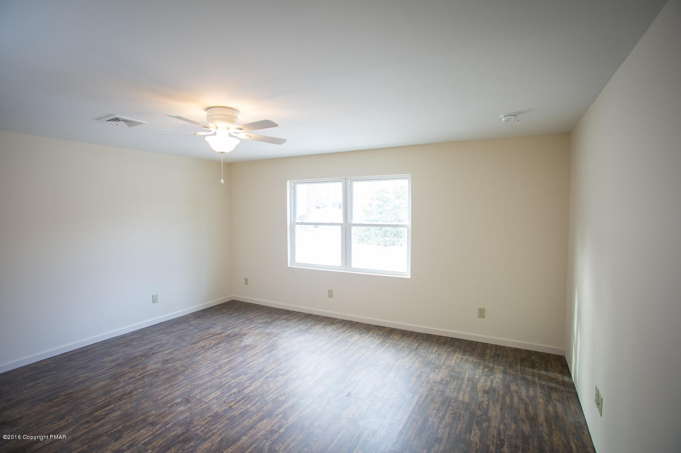 20 Cedar Road Mount Pocono, PA 18344 - Photo 34 of 43 wooden floor in an empty room with a window