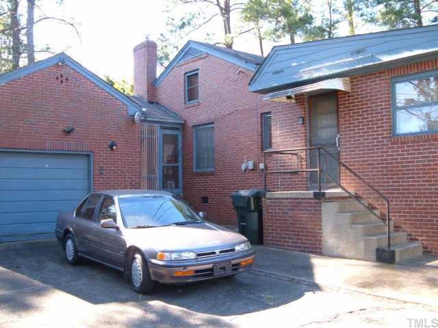 3420 Churchill Road Raleigh, NC 27607 - Photo 3 of 10 a car parked in front of a house
