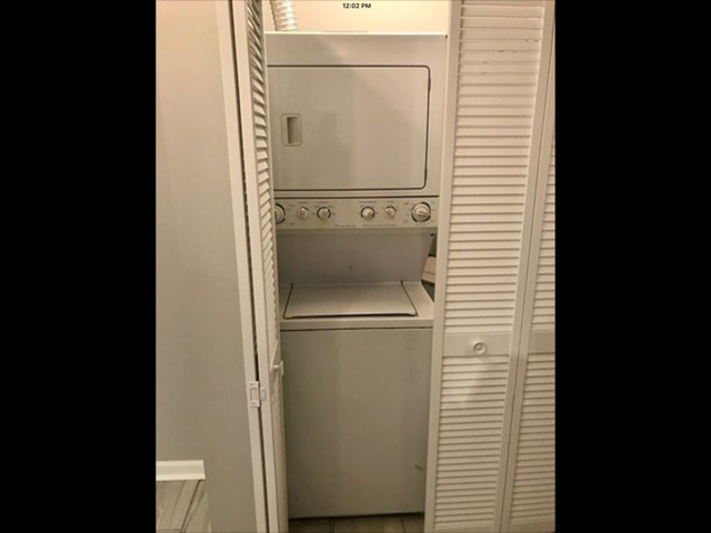 6704 South Ridgeland Avenue, Unit 2D Chicago, IL 60649 - Photo 10 of 11 a utility room with dryer and washer