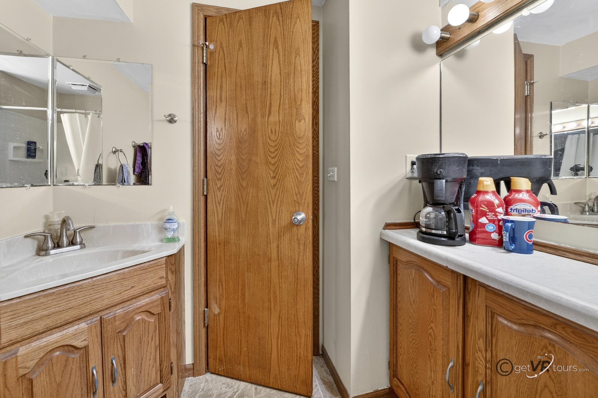 1731 South Demeter Drive Freeport, IL 61032 - Photo 28 of 40 a bathroom with a sink and a mirror