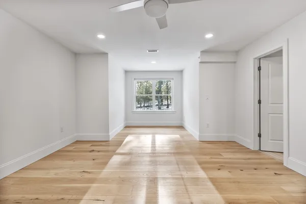 a view of an empty room and window