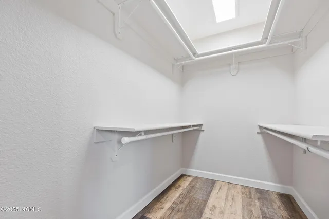 a view of a room with racks on the wall