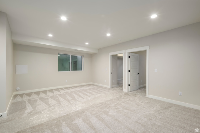 250 South Main Street, Unit 9 Alpine, UT 84004 - Photo 18 of 34 Finished below grade area featuring light carpet and recessed lighting