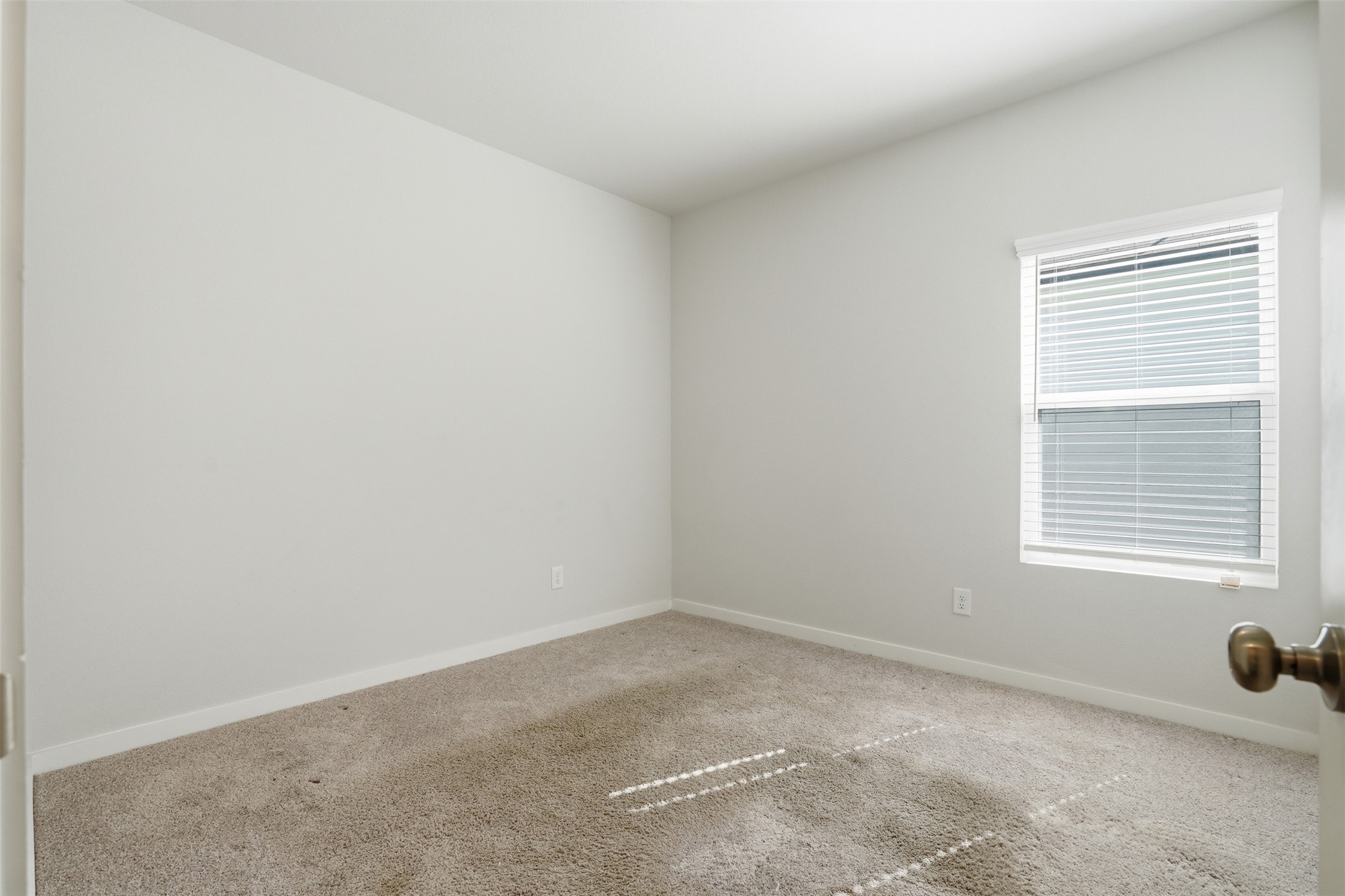 16994 Pandora Way Porter, TX 77365 - Photo 9 of 25 an empty room with a window