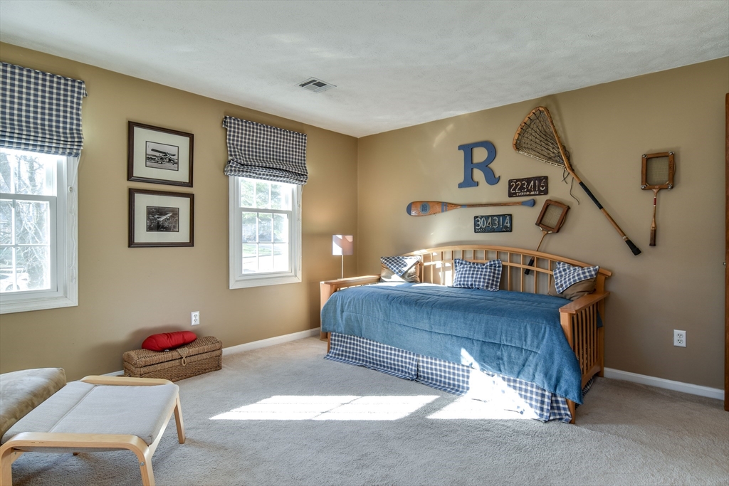 7 Gibbs Valley Path Framingham, MA 01701 - Photo 26 of 39 a living room with furniture and window