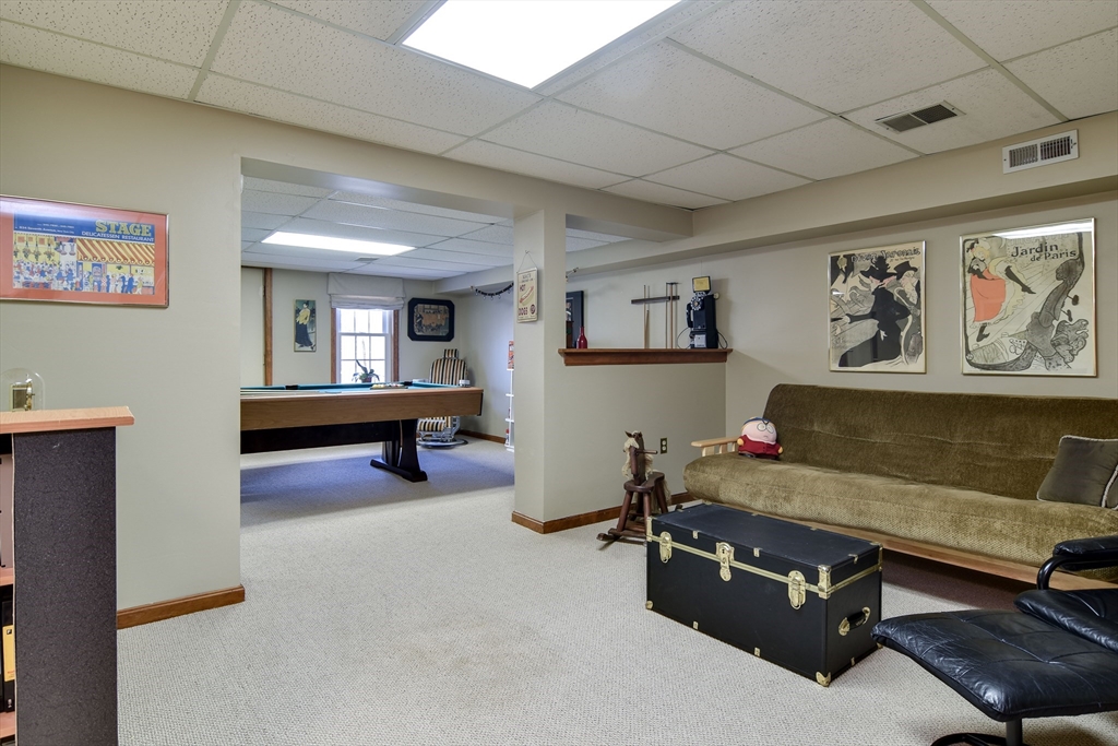 7 Gibbs Valley Path Framingham, MA 01701 - Photo 27 of 39 a room with furniture and air hockey table
