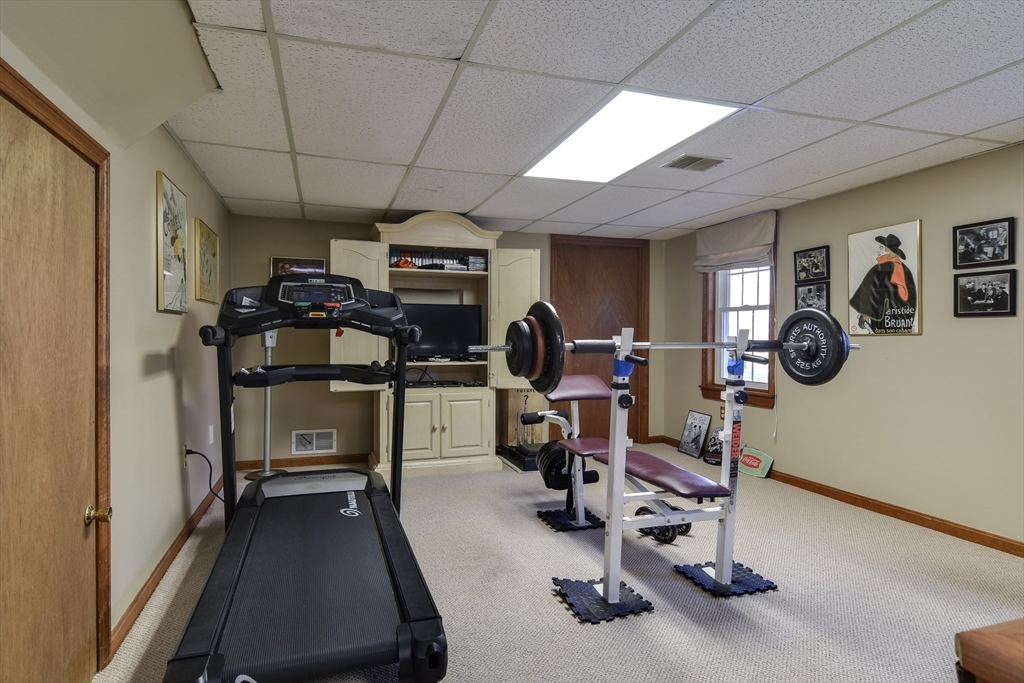 7 Gibbs Valley Path Framingham, MA 01701 - Photo 30 of 39 a view of a room with gym equipment