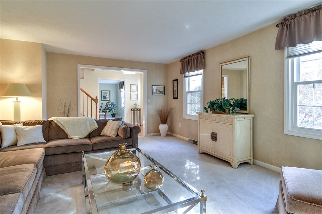 7 Gibbs Valley Path Framingham, MA 01701 - Photo 5 of 39 a living room with furniture a window and wooden floor