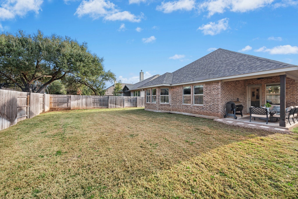 113 Wake Lane Georgetown, TX 78633 - Photo 25 of 33 a view of a house with swimming pool and sitting area