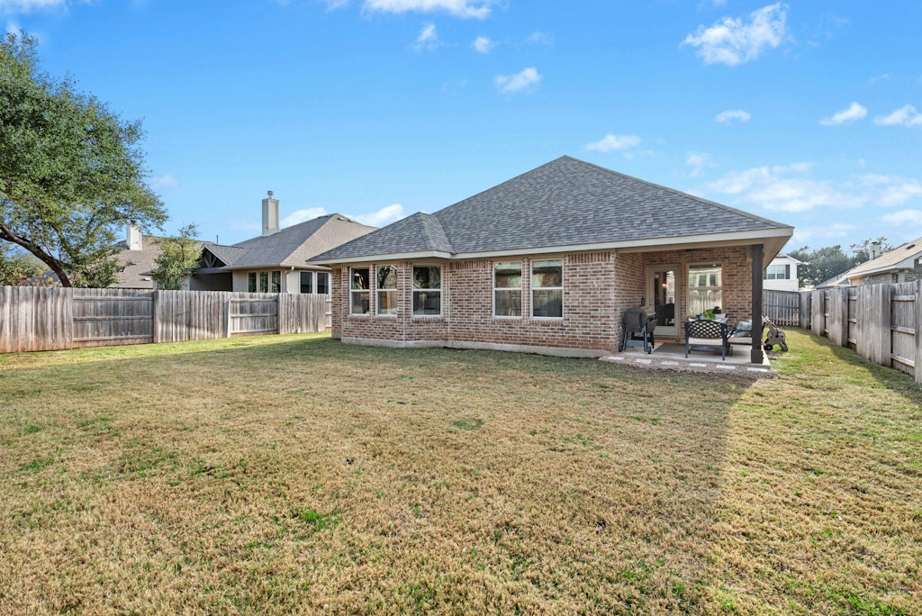 113 Wake Lane Georgetown, TX 78633 - Photo 26 of 33 a house with swimming pool in front of it