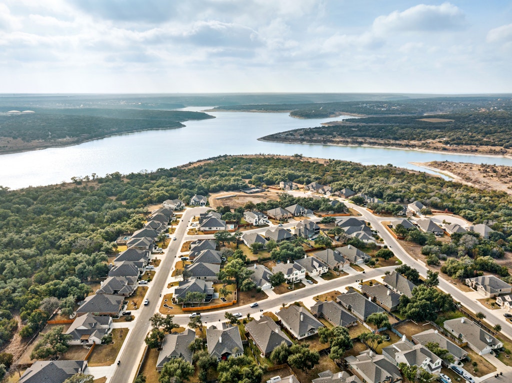 113 Wake Lane Georgetown, TX 78633 - Photo 27 of 33 an aerial view of ocean and residential houses with outdoor space