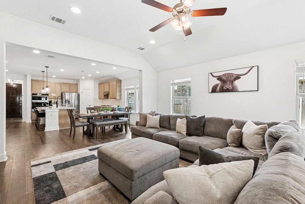 113 Wake Lane Georgetown, TX 78633 - Photo 32 of 33 a living room with furniture and kitchen view