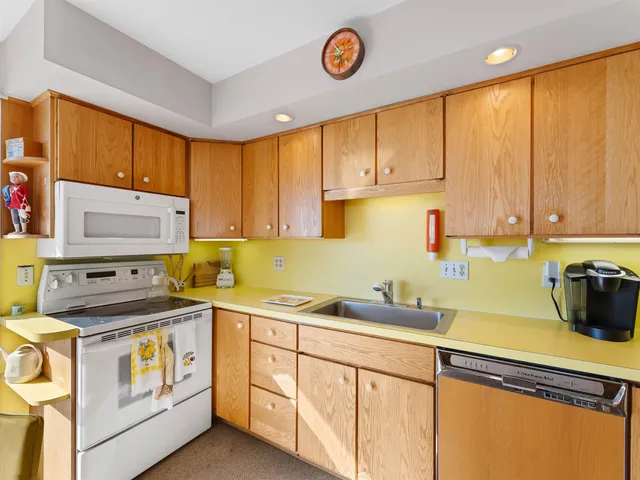 a dining room with furniture and a window
