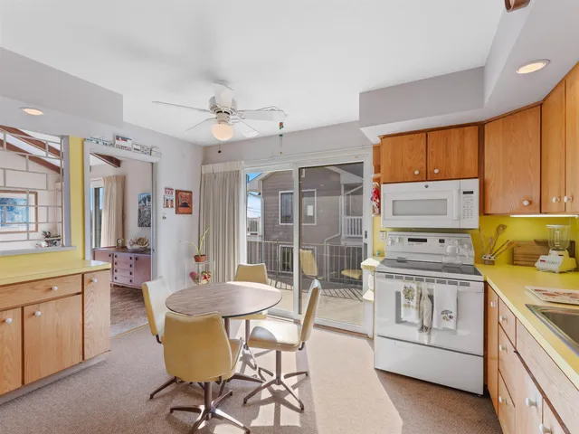 a bed room with a bed window and dresser