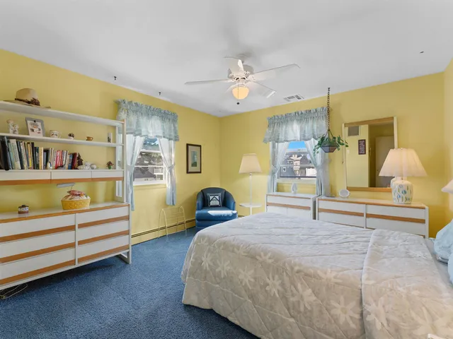 a bedroom with a bed and a cabinets