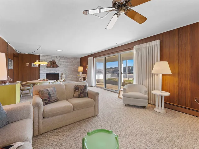 a bedroom with a large bed and a dresser