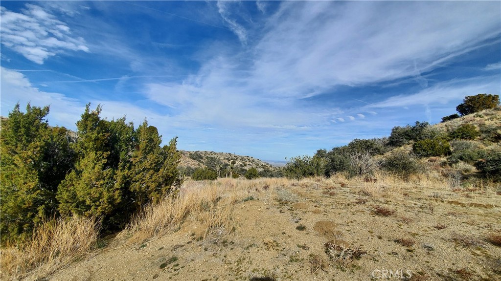 0 Vicinity Ross Road Juniper Hills, CA 93543 - Photo 36 of 50 a view of mountain view with wooden fencing