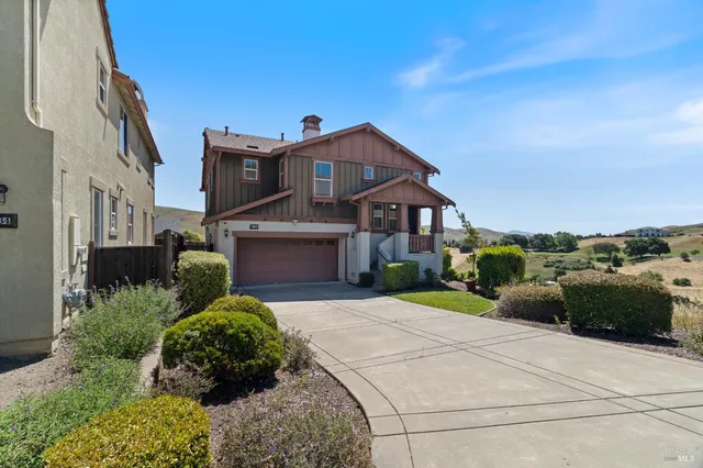 a house view with a garden space