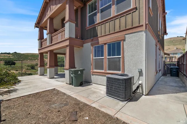 a view of a building with a patio