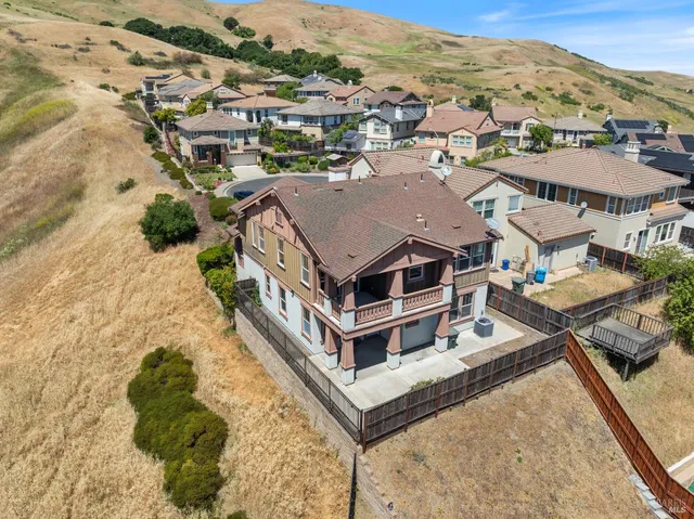 a aerial view of a house with a ocean view